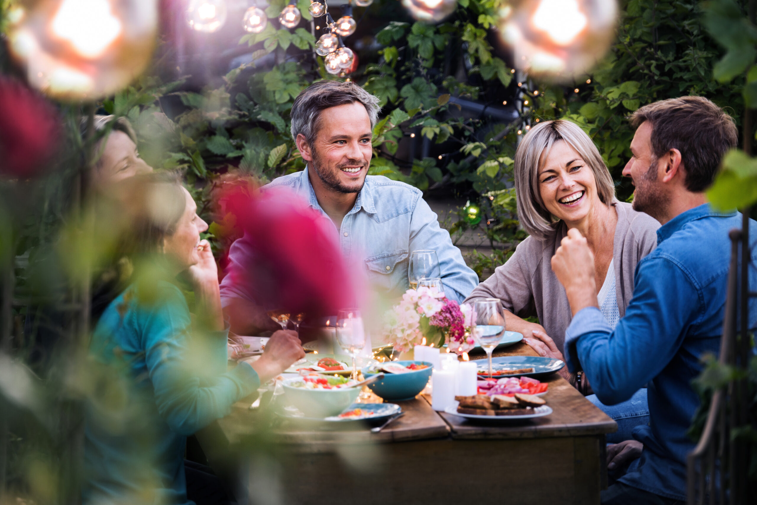 Group of friends gathered around a table