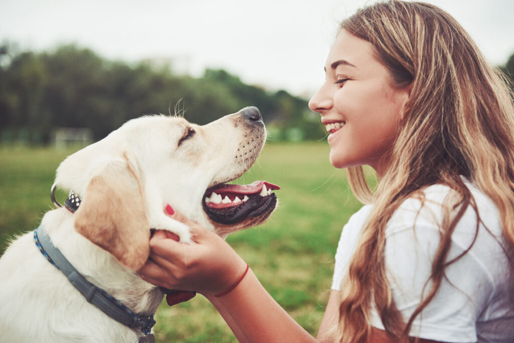 girl with a beautiful dog