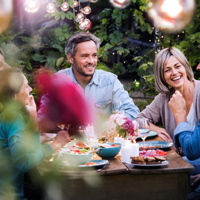 Group of friends gathered around a table