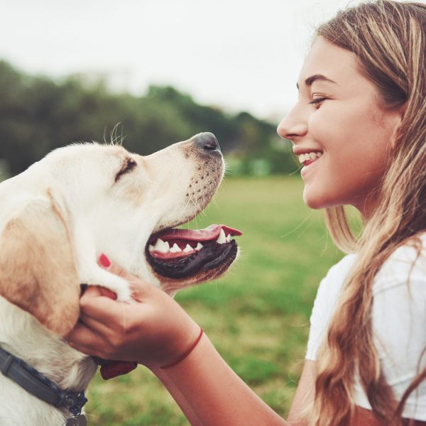 girl with a beautiful dog