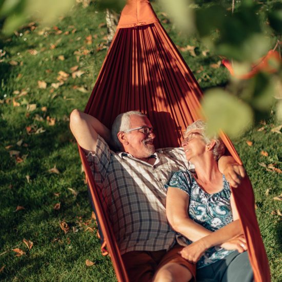 senior couple bonding on the hammock